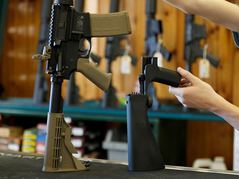 © Reuters. FILE PHOTO: A bump fire stock that attaches to a semi-automatic rifle to increase the firing rate is seen at Good Guys Gun Shop in Orem