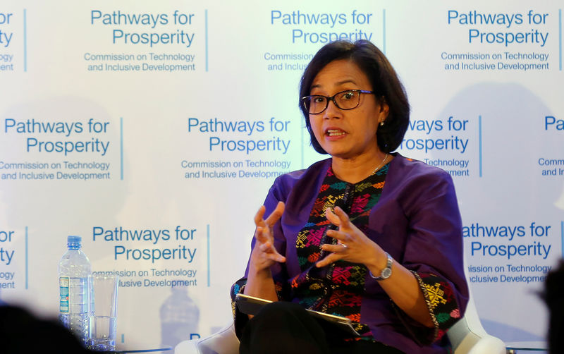 © Reuters. FILE PHOTO: Indonesian Finance Minister Sri Mulyani Indrawati gestures during a panel discussion in Nairobi