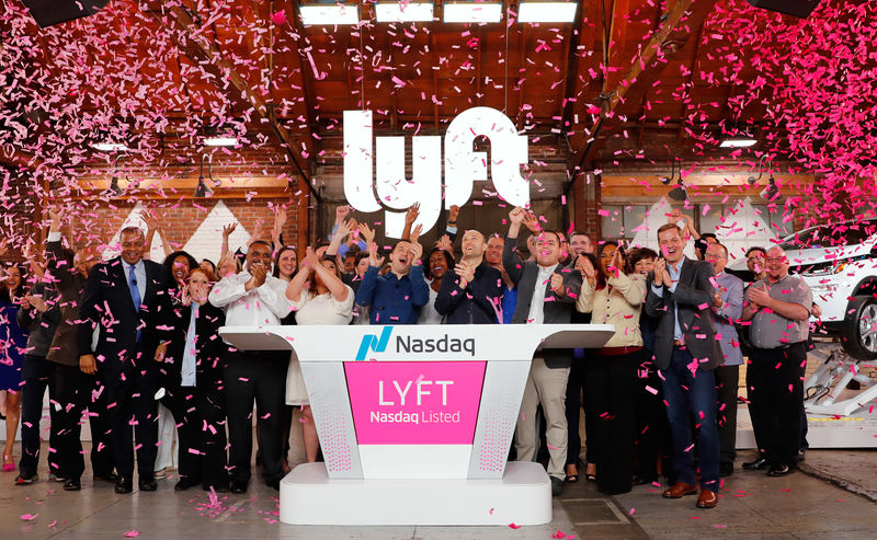 © Reuters. Executivos da Lyft no dia em que a empresa estreou no Nasdaq, em Los Angeles