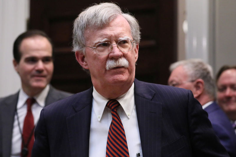 © Reuters. FILE PHOTO - White House national security adviser Bolton attends Trump-Rosales meeting at the White House in Washington