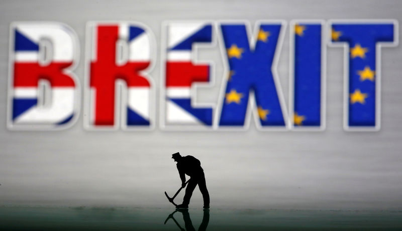 © Reuters. A small toy figure is seen in front of a Brexit logo in this illustration picture