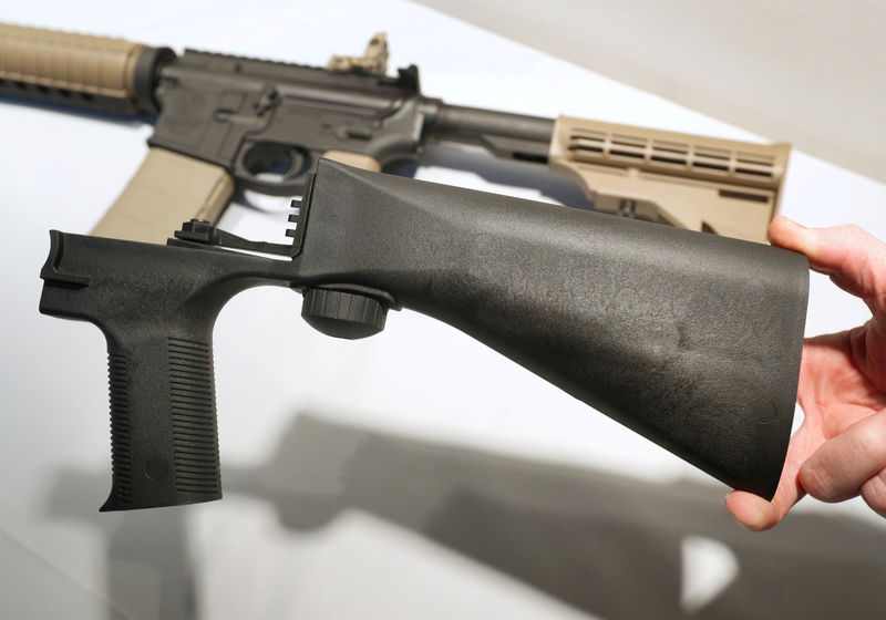 © Reuters. FILE PHOTO: A bump fire stock that attaches to a semi-automatic rifle to increase the firing rate is seen at Good Guys Gun Shop in Orem