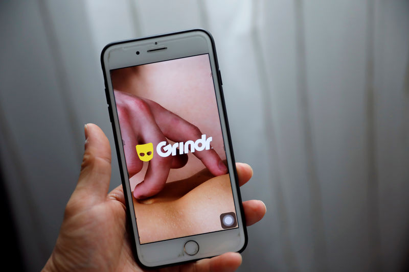 © Reuters. Grindr app is seen on a mobile phone in this photo illustration taken in Shanghai