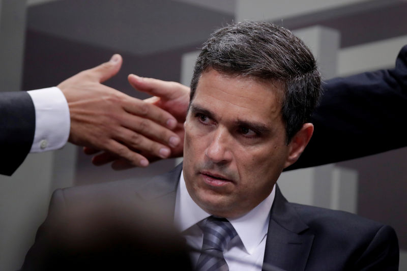 © Reuters. FILE PHOTO: Senior banking executive Roberto Campos Neto, nominee by Brazilian President Jair Bolsonaro to head the Brazil's Central Bank, participates a meeting at CAE of the Brazilian Federal Senate in Brasilia