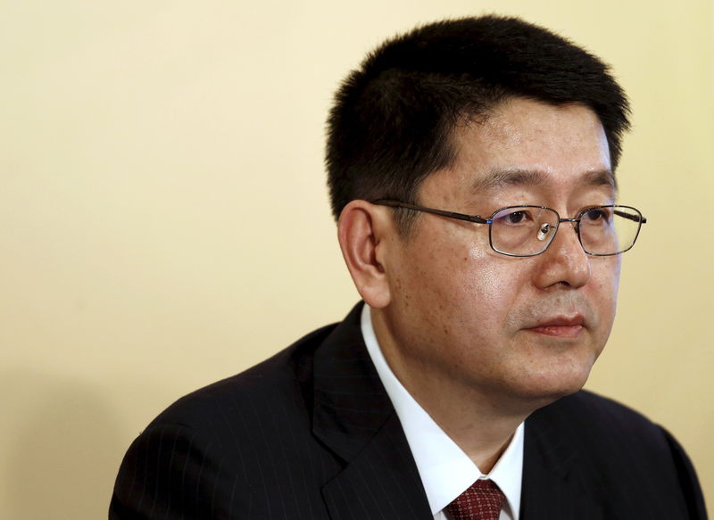 © Reuters. FILE PHOTO: BoCom President Peng Chun attends a news conference on the lender's annual results in Hong Kong