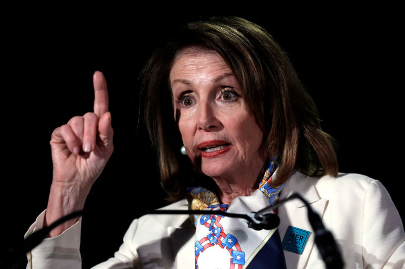 © Reuters. FILE PHOTO: House Speaker Nancy Pelosi delivers remarks at a National Portrait Gallery Women's History Month reception in Washington