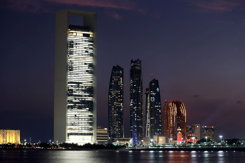 © Reuters. FILE PHOTO: General view of the ADNOC headquarters and Emirates Towers are seen in Abu Dhabi