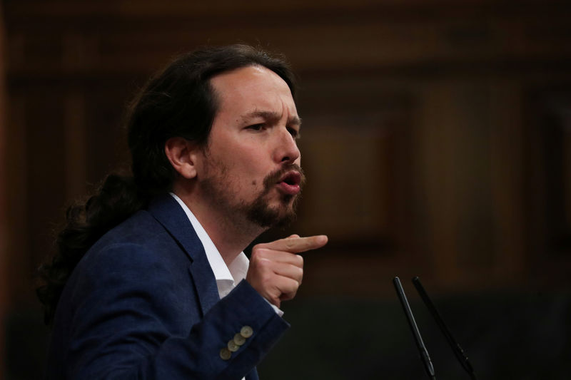 © Reuters. nFILE PHOTO: Podemos (We Can) party leader Pablo Iglesias delivers a speech during a motion of no confidence debate at Parliament in Madrid
