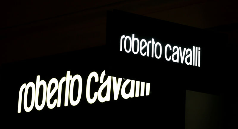 © Reuters. FILE PHOTO: A company logo is pictured outside a Roberto Cavalli store in Vienna