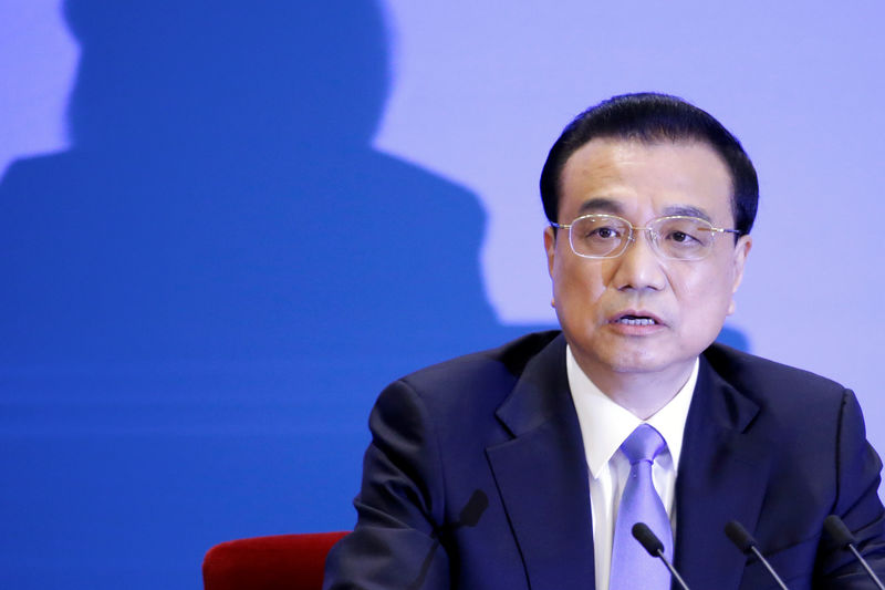 © Reuters. FILE PHOTO: Chinese Premier Li Keqiang speaks at a news conference following the closing session of the National People's Congress (NPC) at the Great Hall of the People in Beijing