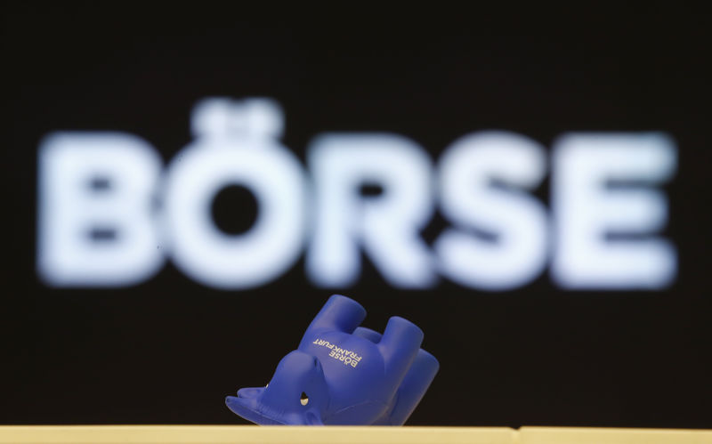 © Reuters. A styrofoam bull figure lies on its side on a counter at Frankfurt's stock exchange