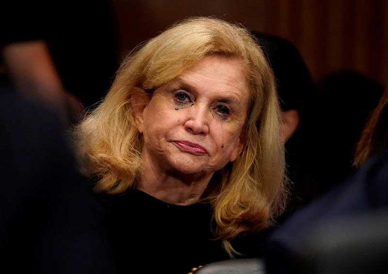 © Reuters. Rep. Carolyn Maloney (D-NY) cries as Christine Blasey Ford testifies before the Senate Judiciary Committee on Capitol Hill in Washington