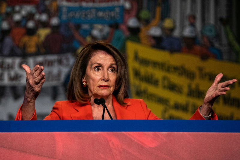 © Reuters. FILE PHOTO - House Speaker Nancy Pelosi (D-CA) addresses the North America's Building Trades Unions (NABTU) 2019 legislative conference in Washington