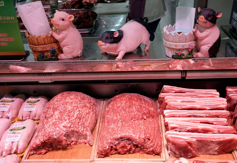 © Reuters. Pork for sale is seen at a supermarket in Beijing