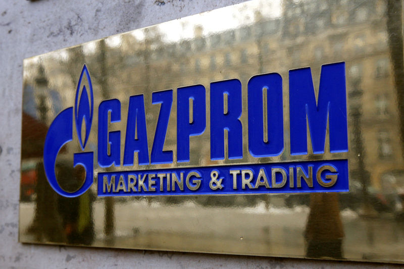 © Reuters. FILE PHOTO: The logo of Gazprom marketing department is seen in front of the office located on the Champs Elysees in Paris