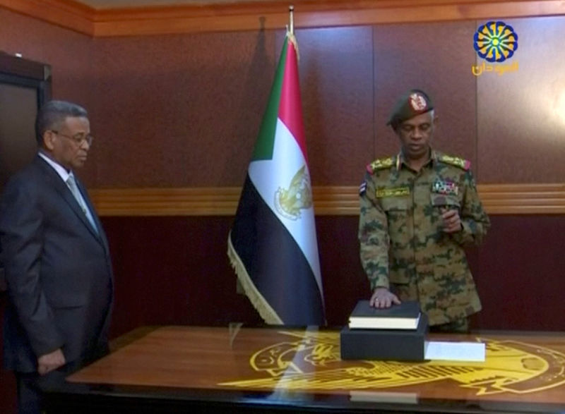 © Reuters. Sudan's Defence Minister Awad Mohamed Ahmed Ibn Auf is sworn in as a head of Military Transitional Council in Sudan