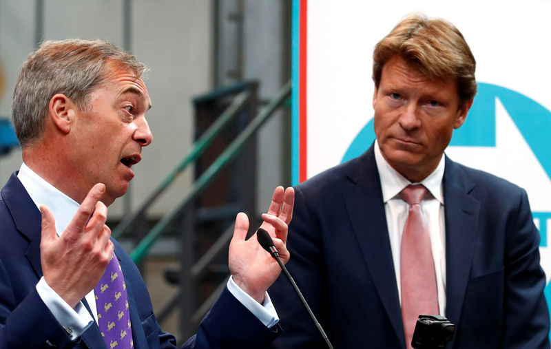 © Reuters. Nigel Farage speaks as Chairman Richard Tice looks on during the launch of the newly created 'Brexit Party' campaign for the European elections, in Coventry