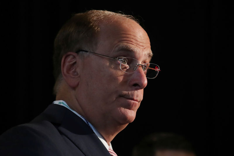 © Reuters. FILE PHOTO:  Larry Fink, Chief Executive Officer of BlackRock, stands at the Bloomberg Global Business forum in New York
