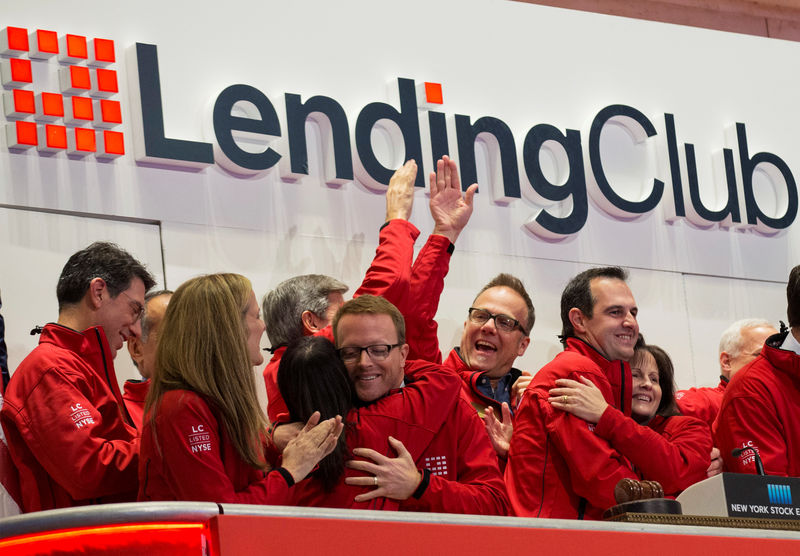 © Reuters. FILE PHOTO:  Laplanche Founder and CEO of Lending Club celebrates with company executives after ringing the opening bell during their IPO at the NYSE