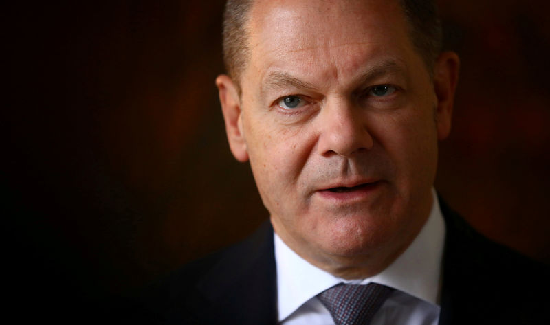 © Reuters. FILE PHOTO: German Finance Minister Olaf Scholz attends a Reuters interview in Berlin