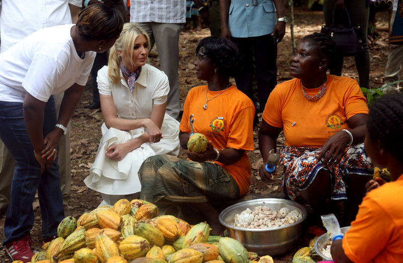 © Reuters. White House Advisor Ivanka Trump talks to women entrepreneurs, at the demonstration cocoa farm in Adzope