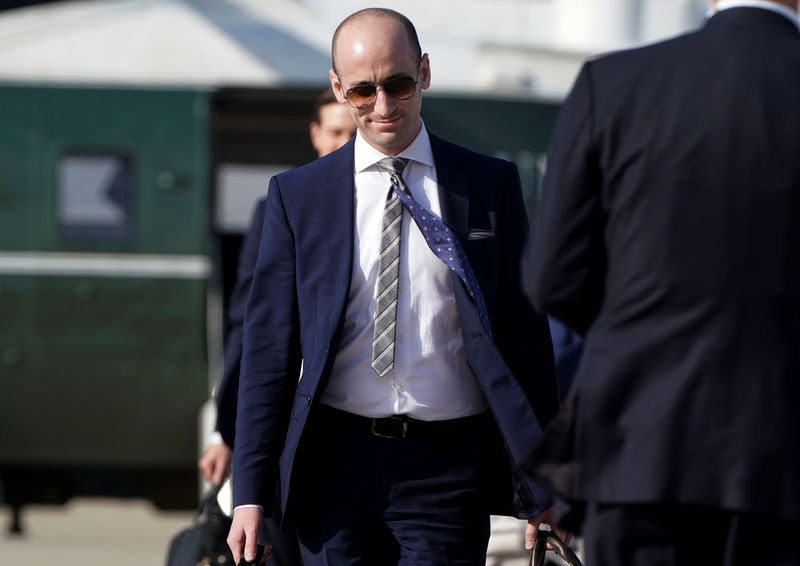 © Reuters. White House adviser Miller departs with U.S. President Trump on travel to Michigan from Joint Base Andrews in Maryland