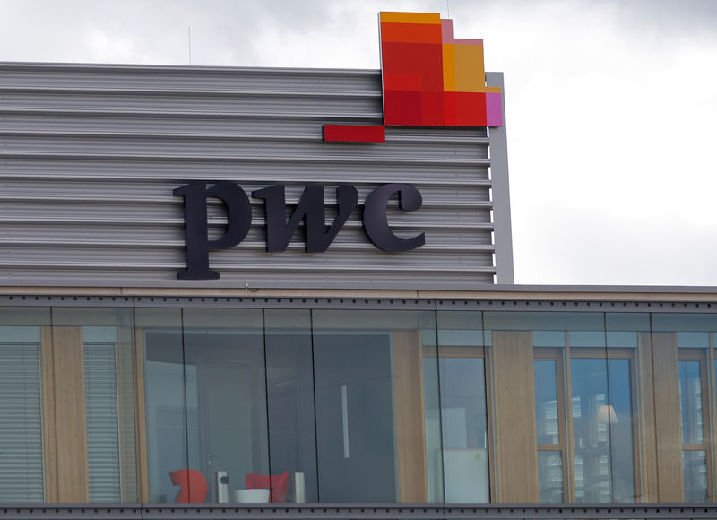 © Reuters. FILE PHOTO:  The logo of PwC is seen on the local offices building of the company in Luxembourg