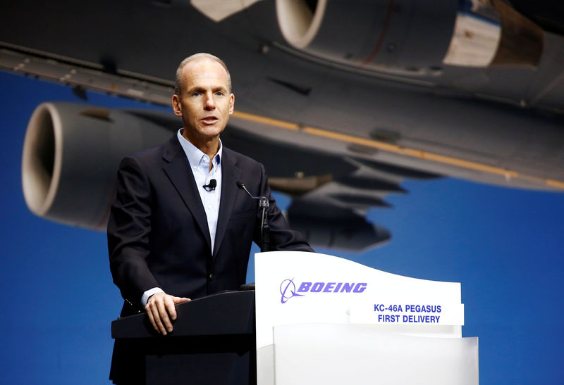 © Reuters. FILE PHOTO: Boeing Chairman, President and CEO Muilenburg speaks during a delivery celebration of the Boeing KC-46 Pegasus aerial refueling tanker to the U.S. Air Force in Everett, Washington