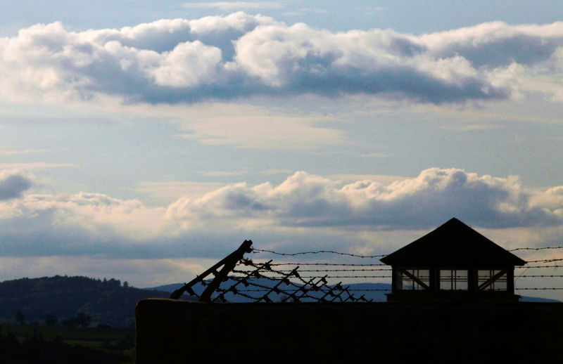 © Reuters. FILE PHOTO: A watch tower is pictured at the former Austrian Nazi concentration camp in Mauthausen