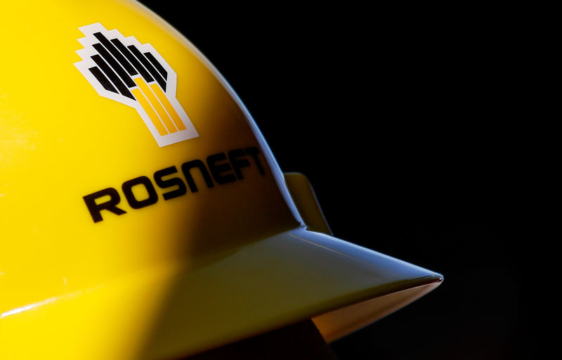 © Reuters. A view shows a helmet with the logo of Rosneft company in Vung Tau