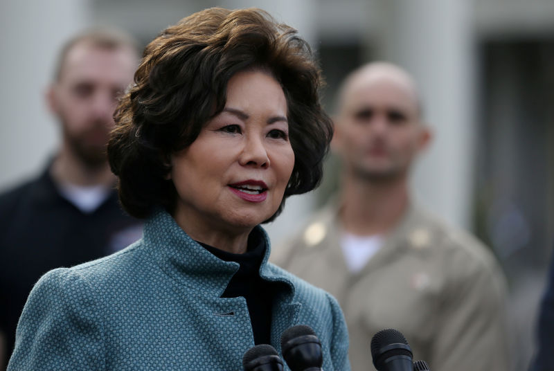 © Reuters. FILE PHOTO: U.S. Secretary Elaine Chao speaks to the news media outside of the West Wing of the White House