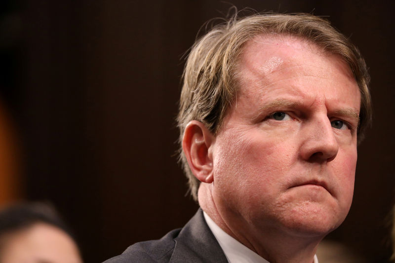 © Reuters. FILE PHOTO: White House Counsel McGahn listens during the confirmation hearing for U.S. Supreme Court nominee Kavanaugh on Capitol Hill in Washington