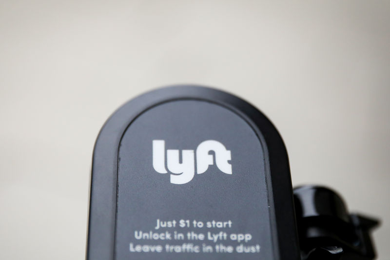 © Reuters. The Lyft  logo is seen on a parked Lyft Scooter in Washington