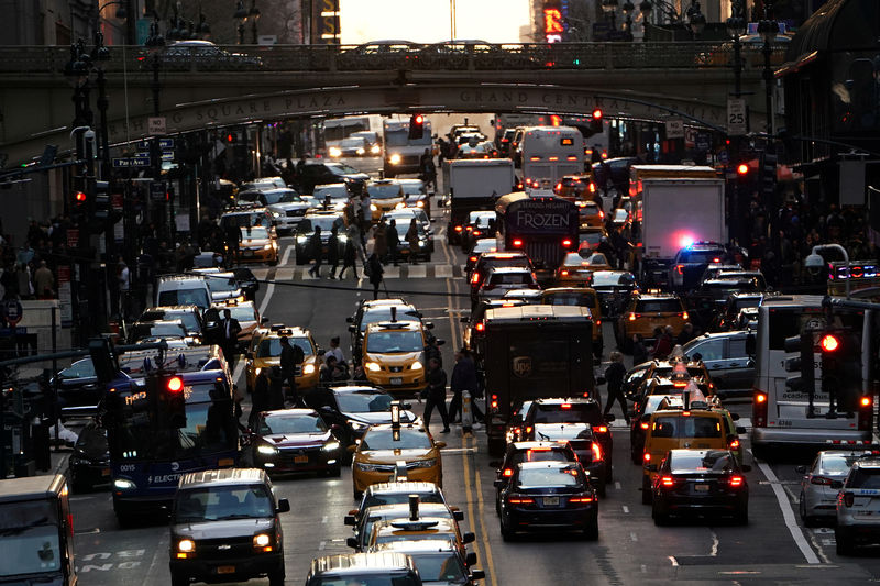 © Reuters. FILE PHOTO: Traffic is pictured at twilight along 42nd St. in Manhattan