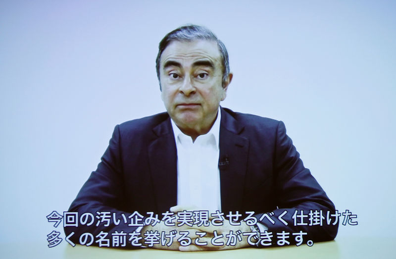 © Reuters. A video statement made by the former Nissan Motor chairman Carlos Ghosn is shown on a screen during a news conference by his lawyers at Foreign Correspondents' Club of Japan in Tokyo