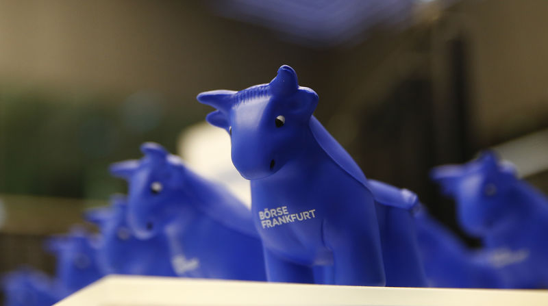 © Reuters. Styrofoam bull figures stand on a counter on the trading floor at the stock exchange in Frankfurt