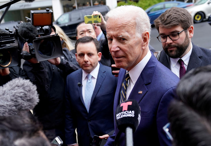 © Reuters. FILE PHOTO: Former Vice President Biden speaks to reporters after speaking at electrical workers’ conference in Washington