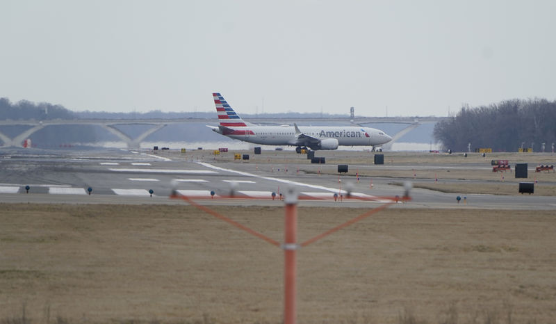 © Reuters. FILE PHOTO: An American Airlines Boeing 737 MAX 8 flight taxis after landing at Reagan National Airport in Washington