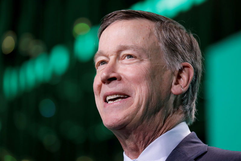 © Reuters. FILE PHOTO: Former Gov. John Hickenlooper speaks at the United States Conference of Mayors winter meeting in Washington