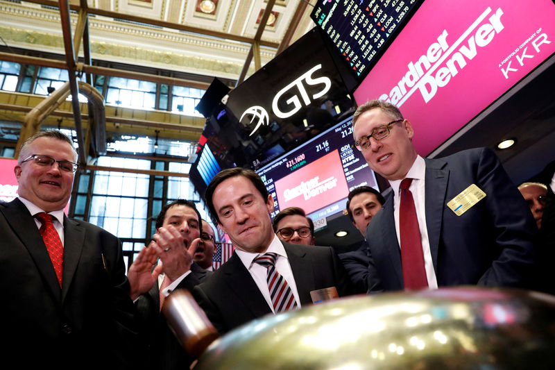 © Reuters. Vicente Reynal, CEO of Gardner Denver, rings a ceremonial bell to celebrate his company's IPO on the floor of the NYSE in New York