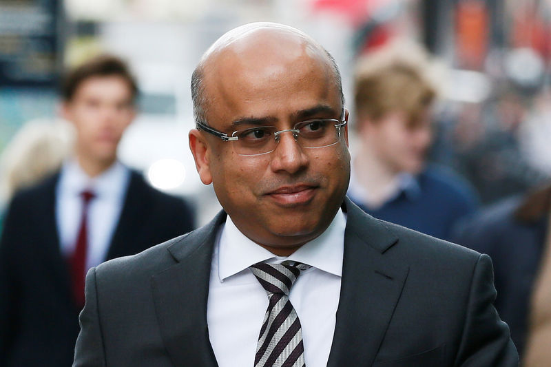 © Reuters. FILE PHOTO: Commodities tycoon Gupta arrives at the Department for Business, Innovation and Skills in London