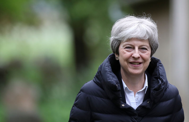 © Reuters. Britain's Prime Minister Theresa May leaves church, near High Wycombe