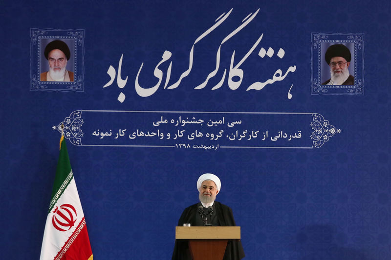 © Reuters. Iranian President Hassan Rouhani speaks during a ceremony marking national Workers' Week in Tehran