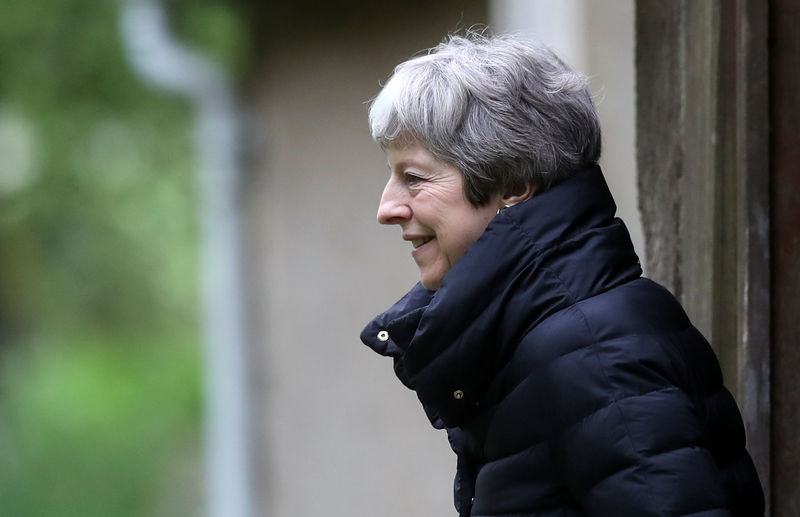 © Reuters. Britain's Prime Minister Theresa May leaves church, near High Wycombe