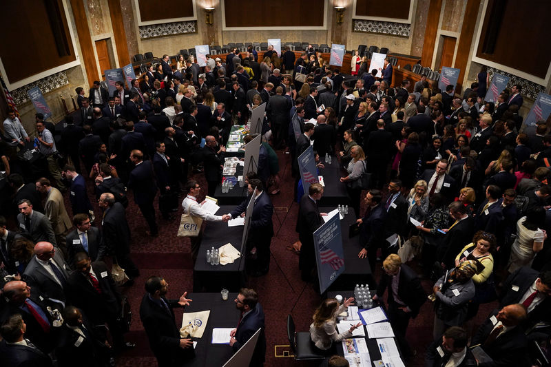 © Reuters. People attend the Executive Branch Job Fair hosted by the Conservative Partnership Institute at the Dirksen Senate Office Building in Washington