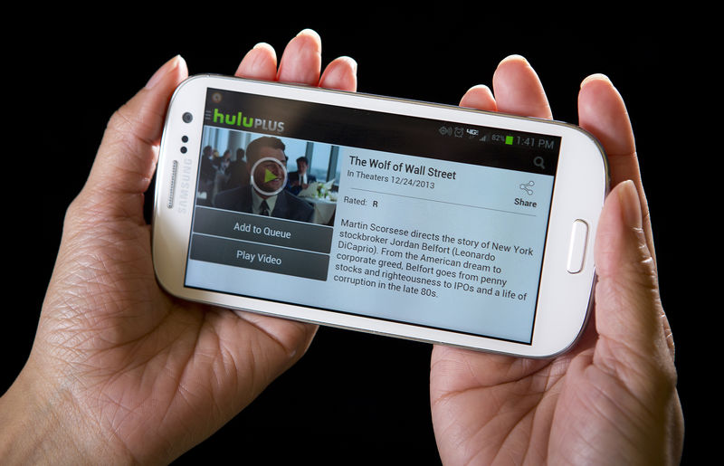 © Reuters. The HULU Plus app plays a movie trailer on a Samsung Galaxy phone in this photo-illustration in New York