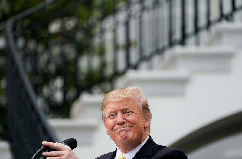 © Reuters. U.S. President Donald Trump reacts during an event honoring 2018 NASCAR Cup Series Champion Joey Logano in Washington