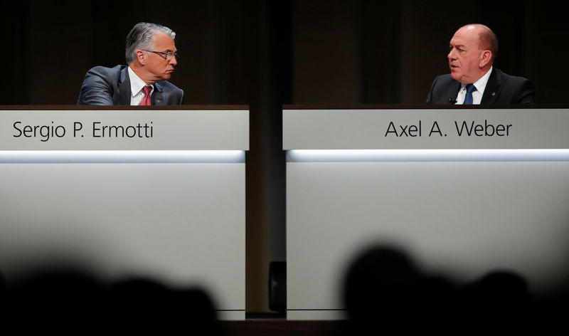 © Reuters. Chairman Weber and CEO Ermotti of Swiss bank UBS attend the annual shareholder meeting in Basel