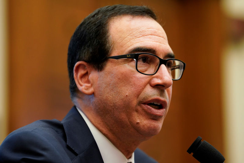 © Reuters. FILE PHOTO - U.S. Treasury Secretary Mnuchin testifies before a House Financial Services Committee hearing on Capitol Hill