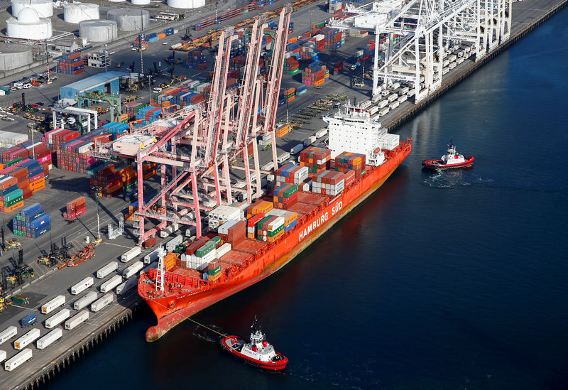 © Reuters. FILE PHOTO: An aerial photo shows the Cap Jackson container ship, currently sailing under the flag of Singapore, docked at Harbor Island at the Port of Seattle in Seattle